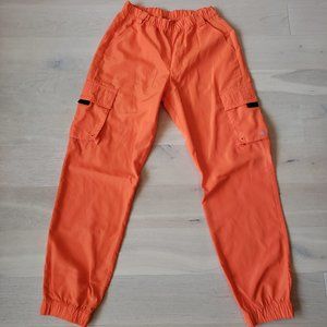 ALO yoga "It Girl" pants in Tangerine